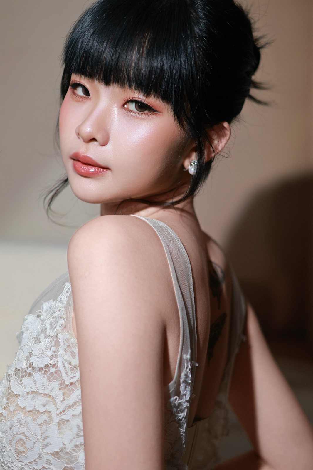 Bridal beauty portrait, looking back