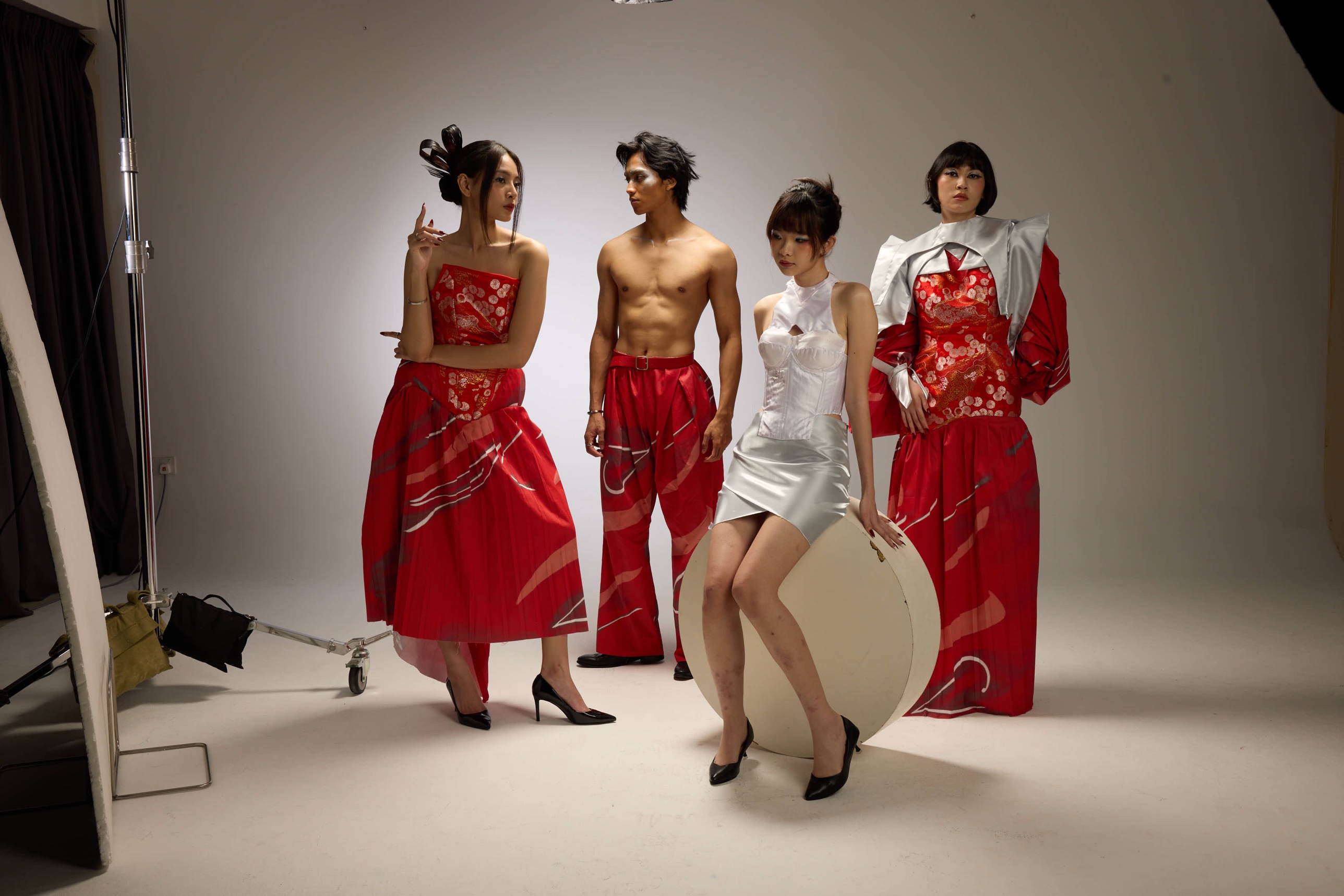 Behind the scenes: the four looks in the studio between setups