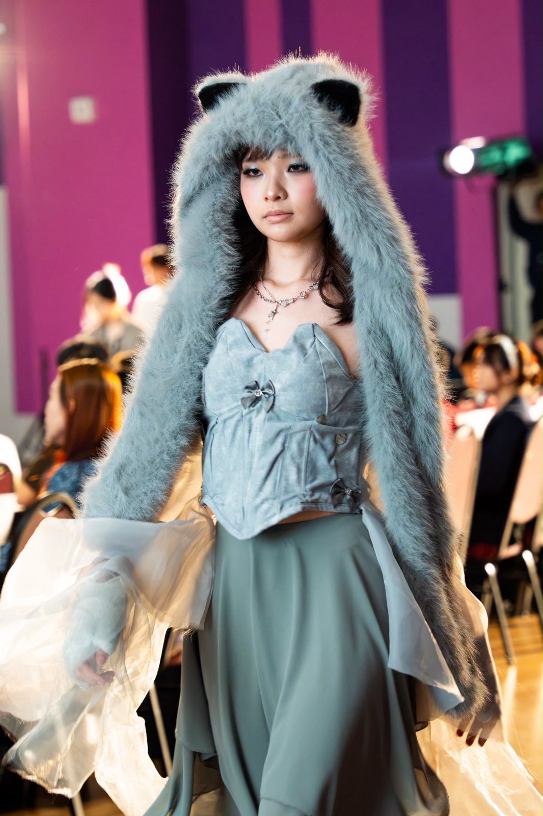 Runway walk, organza sleeves and fur hood