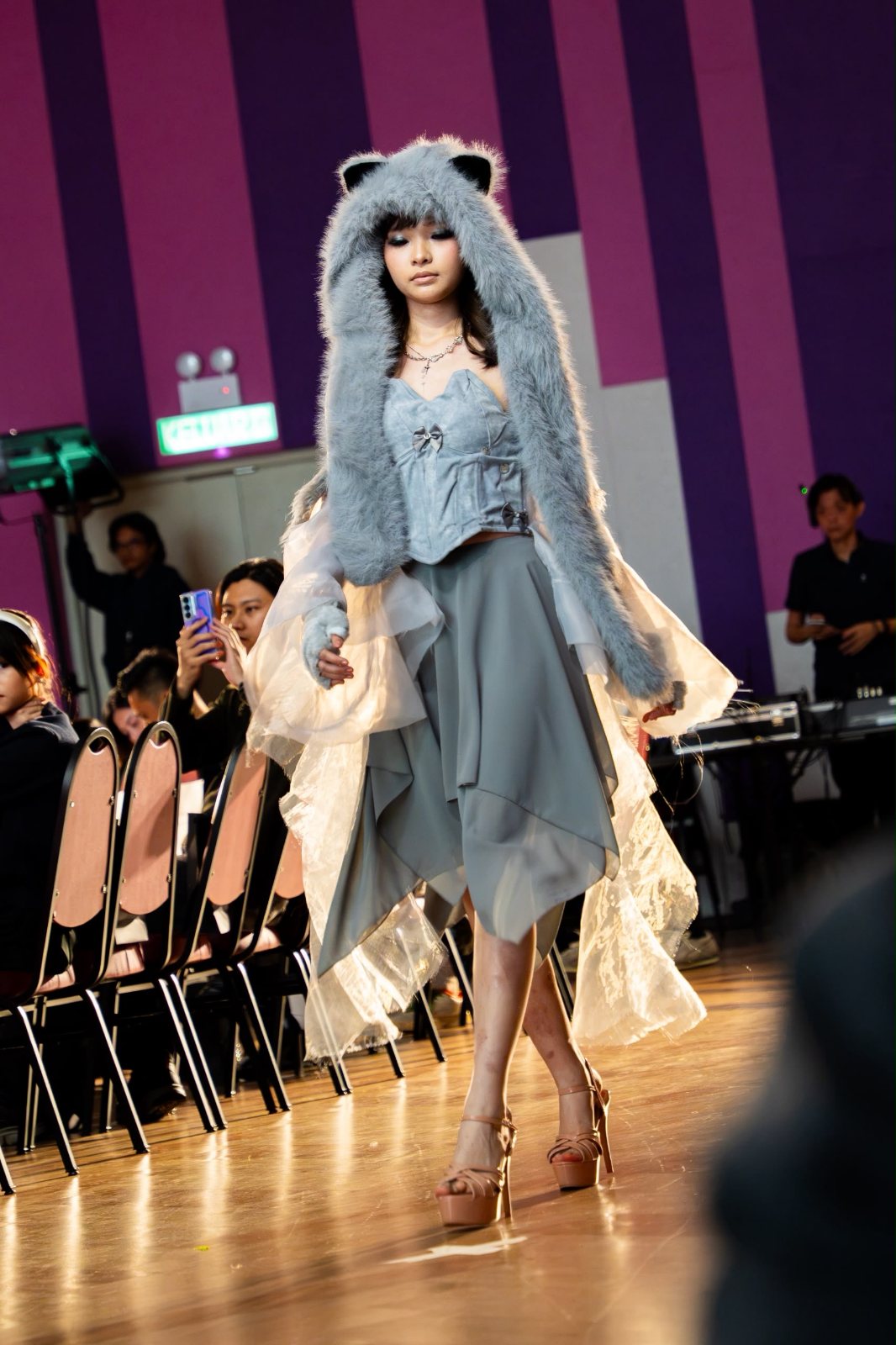 Full-length runway walk in platform heels