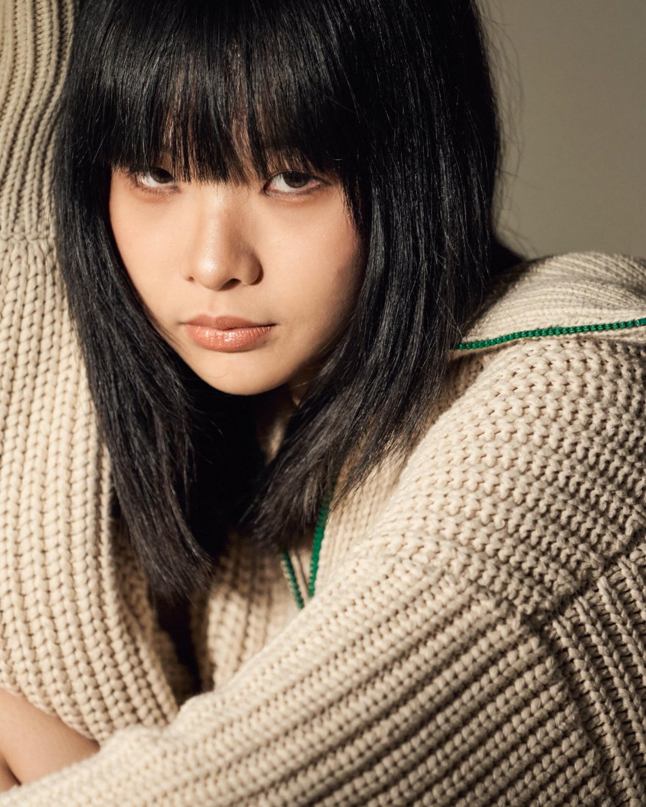 Studio portrait, knit sweater close-up