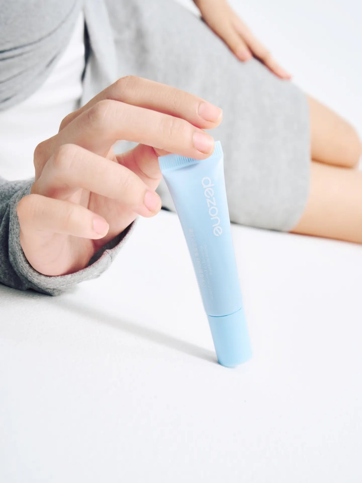 Lipstick campaign, hand with tube