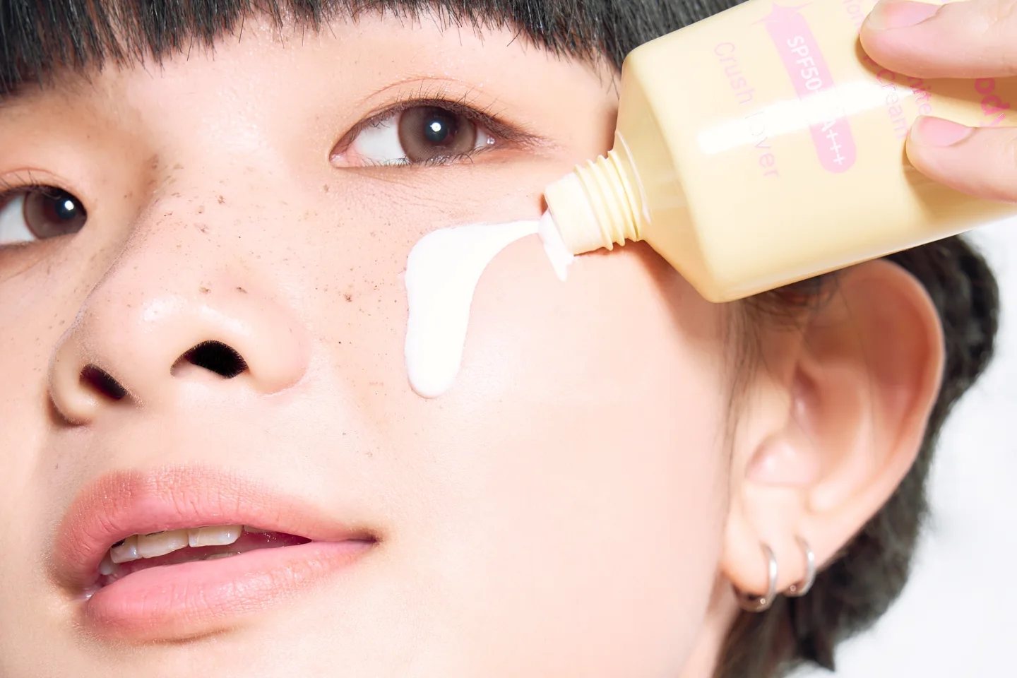 Sunscreen campaign, cream on cheek